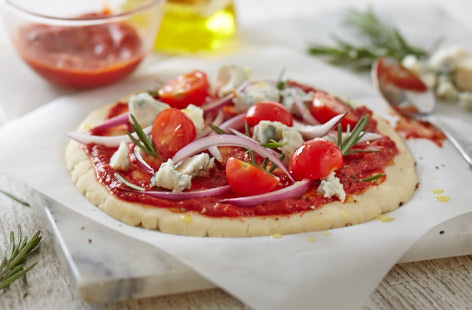 Home-made pizzas are the best, especially when you get to add any toppings you want. This easy-to-follow dough recipe gives you two pizza bases which are wonderfully light and crispy. Then simply add your extra ingredients on top and bake for 15 minutes.
