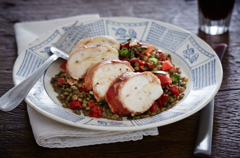 This salad is packed with favourite ingredients: Chicken stuffed with mozzarella and wrapped in parma ham on a lentils with fresh tarragon. Get ahead by cooking the lentils in advance, and toss the remaining salad ingredients in when you're ready to eat.