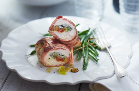 Jazz up your chicken breasts with this blue cheese stuffing and streaky bacon wrap. The filling is made from gently cooked leeks and sliced sundried tomato  mixed with Stilton or Dolcelatte. Top tip: once the breasts are wrapped and ready for cooking, skewer with a cocktail stick.