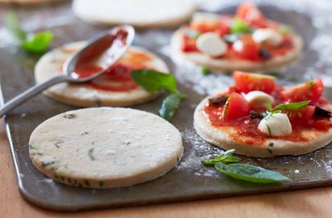 Making your own pizza base is not only very satisfying, but it's also very fun.