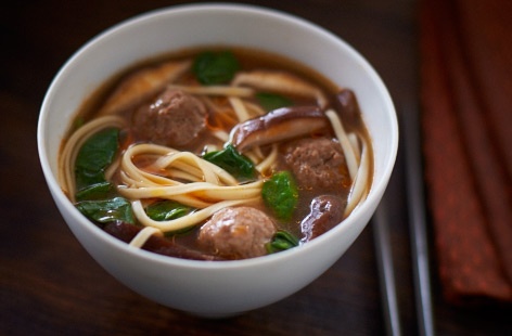 This warming and brothy Japanese soup makes for a filling meal, thanks to a combination of beef meatballs, spinach, shitake mushrooms and ramen noodles all spiced with Asian flavours