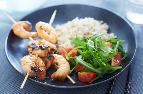 Juicy king prawns marinated in a honey, soy sauce, lemon, coriander seed and garlic mix and grilled to perfection. Preparing and cooking seafood can be super simple and still deliver delicious results.