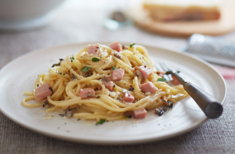 This classic Italian pasta dish is made all the more irresistible with the addition of sweet roasted ham instead of bacon