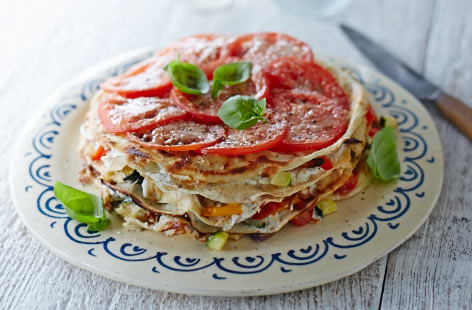 Making your own crêpes is not only fun, but these crêpes have an added bonus – they're made with basil. The summery herb is great alongside the courgette, peppers, cherry tomatoes and red onion, while the ricotta is a nice foil for the riot of flavours.