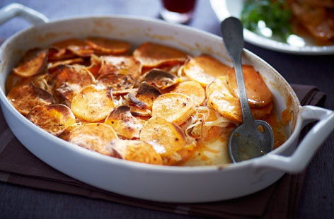 Not sure what to do with all those sweet potatoes? Try this vegan-friendly dish, where layers of thinly sliced sweet potato, softened onion, crushed garlic, and dried herbs are baked in a gratin, then topped with a toasted hazelnut and rocket salad.
