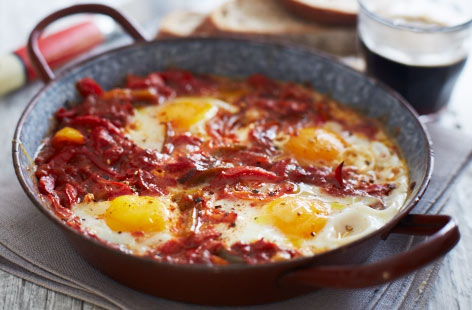 Looking to do something a bit different with eggs? Why not try this dish with its origins in Mexican cooking but with a North African twist. Full of tomato and peppers and flavoured with paprika and chilli, this warming and healthy dish won't disappoint.