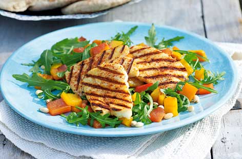 One forkful of this grilled halloumi and roasted pepper salad is all you'll need to be transported to the idyllic Greek isles. Olive oil, good balsamic vinegar, and lemon juice cuts excellently through the salty cheese while toasted pine nuts add a moreish textural contrast.