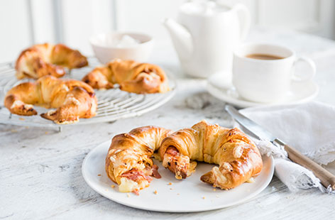 Looking for a breakfast in bed with a difference for Mother's Day? Then try making your very own croissants! Using pre-made croissant dough makes it super easy, but you still get impressive results. Your kids can even help assemble these beautiful bakes