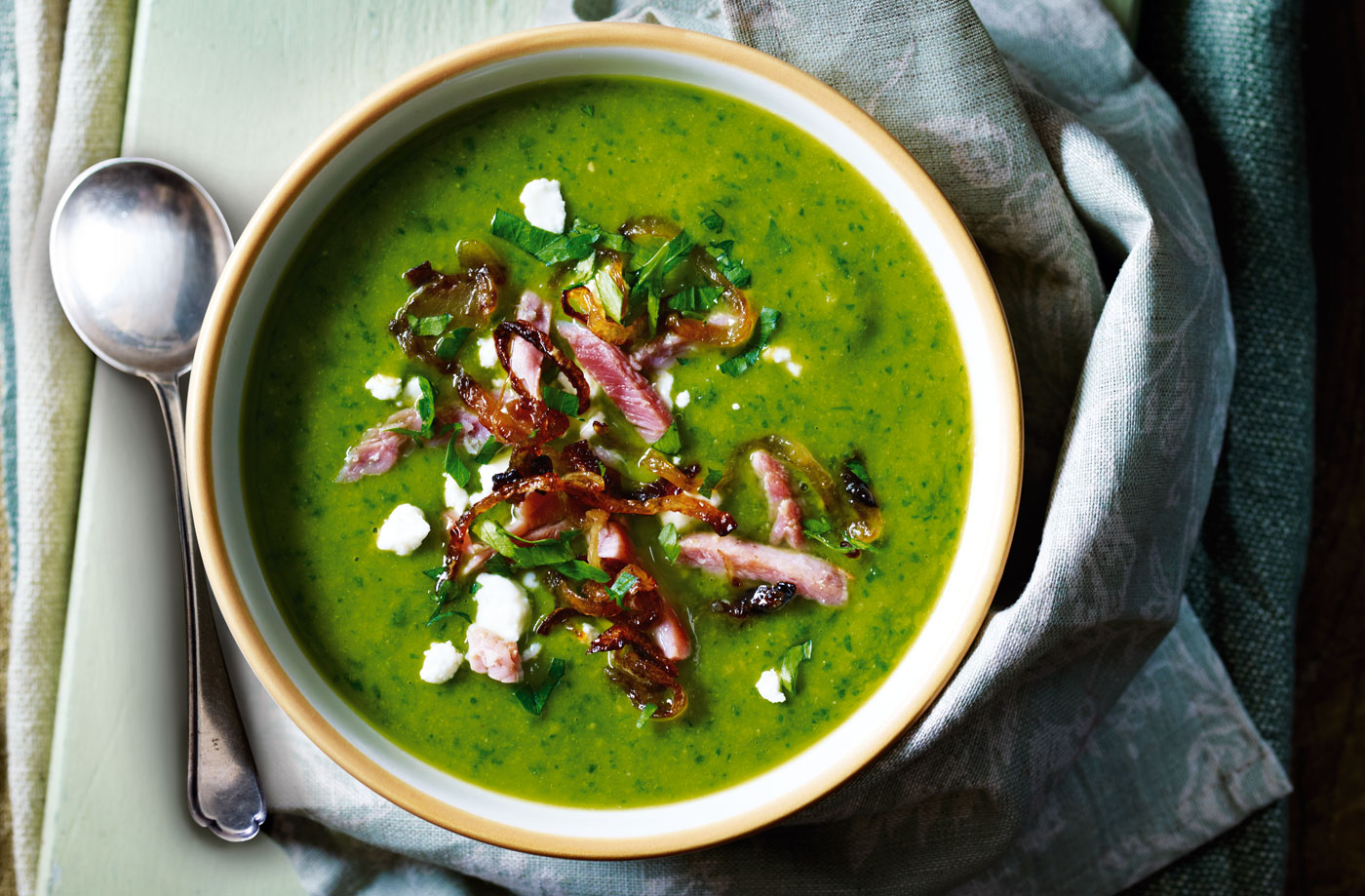 Ham and pea soup with crispy onions and feta recipe
