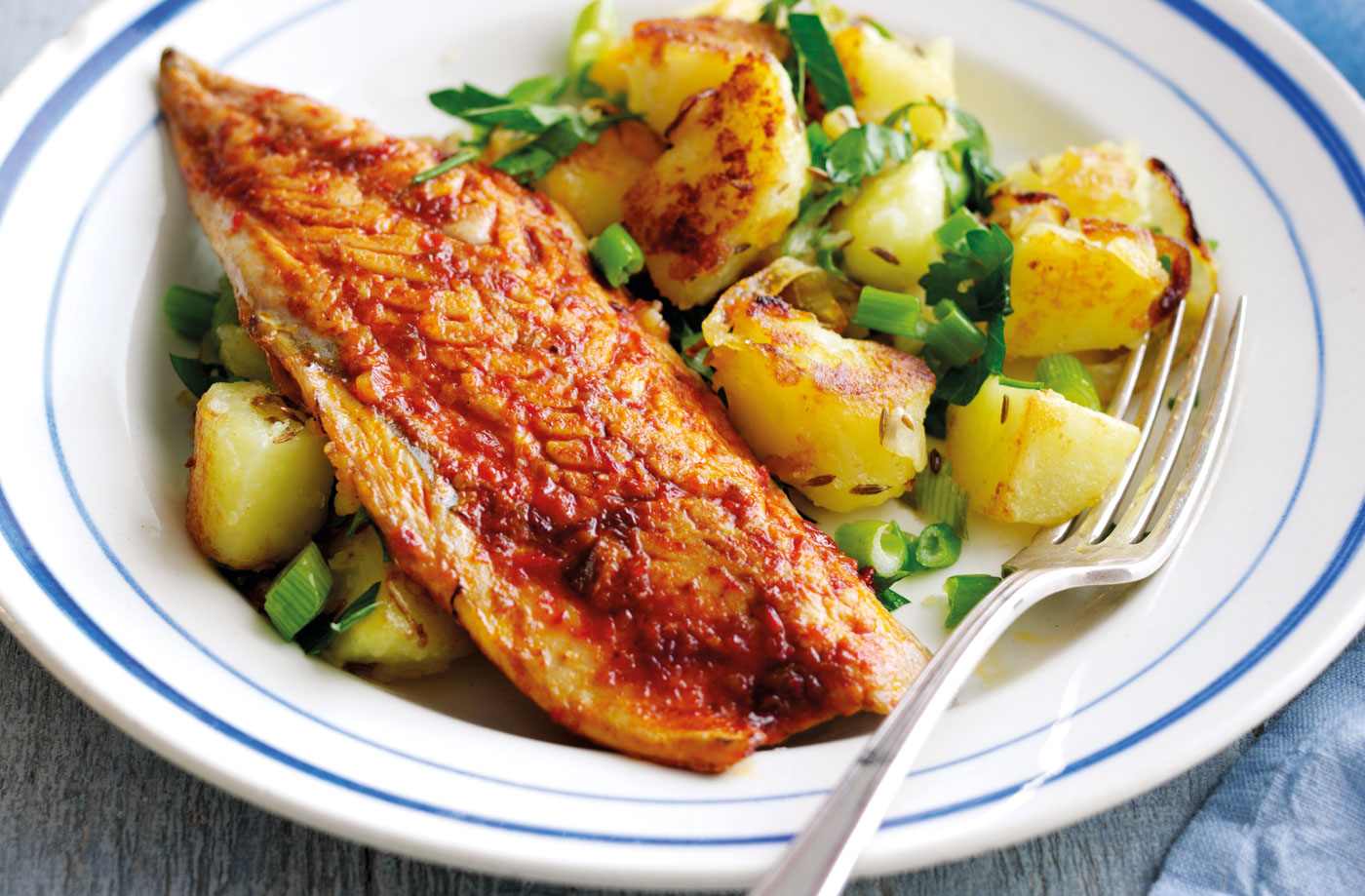Harissa-spiced mackerel with cumin potato hash recipe