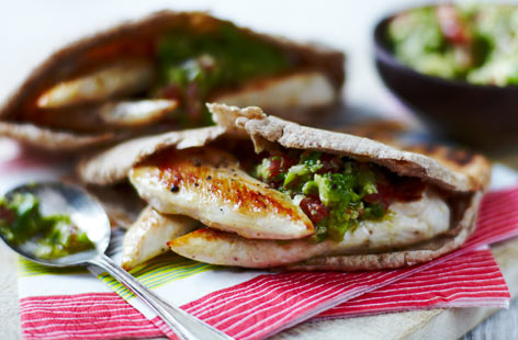 An easy supper of homemade chicken goujons in toasted wholemeal pitta with spicy salsa and salad. The chicken is coated in breadcrumbs, fragrant herbs and spicy paprika before baking. The recipe works just as well with white fish for the pescatarians among you.