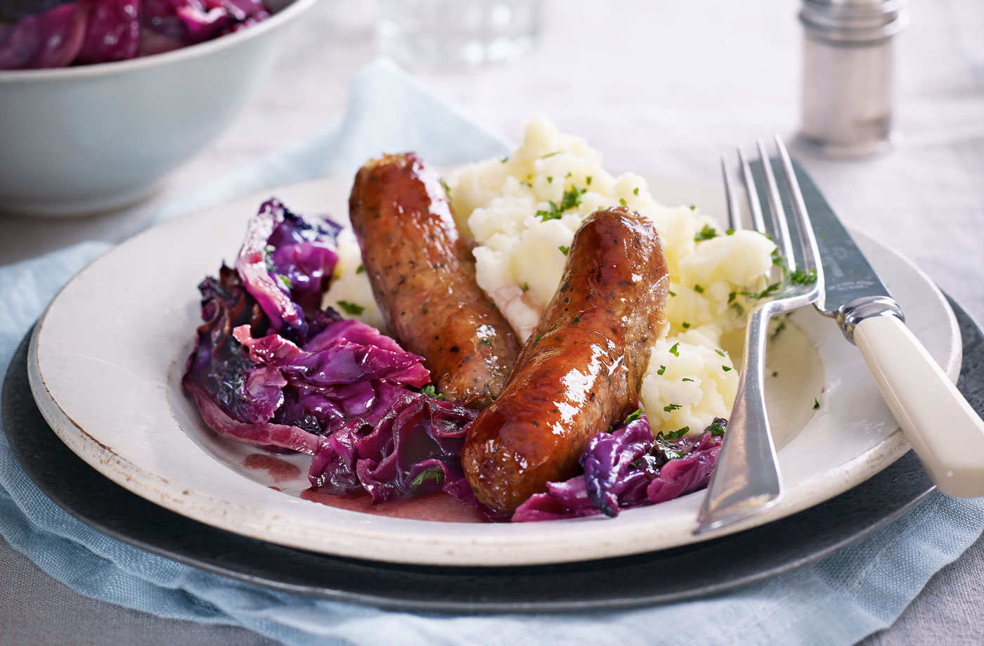 Herby sausages with red cabbage recipe