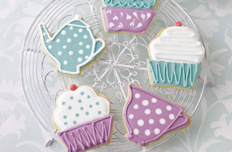 Put your baking skills to the test with this recipe for iced biscuits from the Great British Bake Off. The buttery biscuit bases are made with ground almonds, orange and cinnamon, making them both good to look at and good to eat.