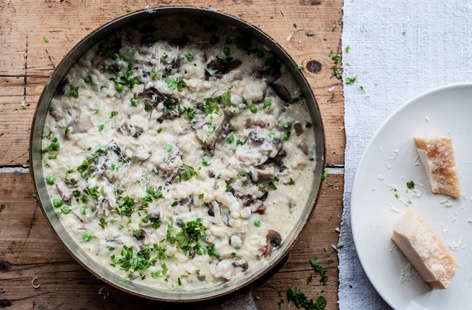 Risotto is a type of Italian rice that is cooked in broth to a creamy consistency containing butter, wine or onion