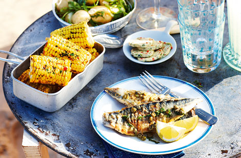 Stick mackerel on the home menu the next time British weather permits. It cooks in moments and here, is served with a new potato, spring onion and rocket salad with a mediterranean-inspired caper, basil and lemon dressing.