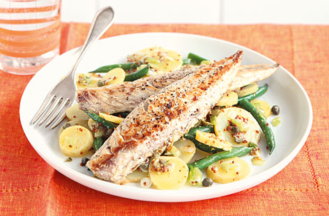 For this speedy lunch, pan-fried mackerel fillets are served with green beans and potatoes tossed in a mustard, lemon juice and olive oil dressing. The capers and spring onions add little bursts of flavour to this filling and wholesome dish.
