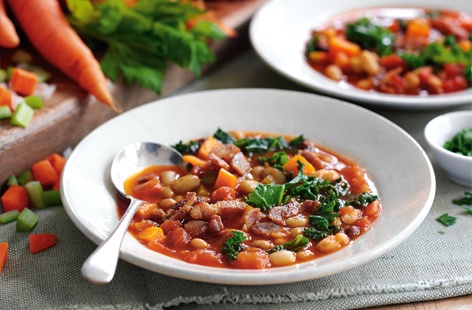 A hearty winter soup where tasty chunks of bacon, mixed beans, and softened carrot, onion and celery are simmered in stock and chopped tomatoes. Shredded kale is stirred in a few minutes before serving for a dash of dark green goodness.