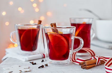 There is nothing like arriving at a party and being handed a glass of mulled wine: surely Christmas in a glass. This classic hot drink includes gently heated wine and port of course, but also citrus fruit, and spices including cinnamon and cloves.