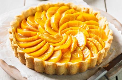A sweet, fruity twist on a classic tart filled with luxe crème pâtissière 