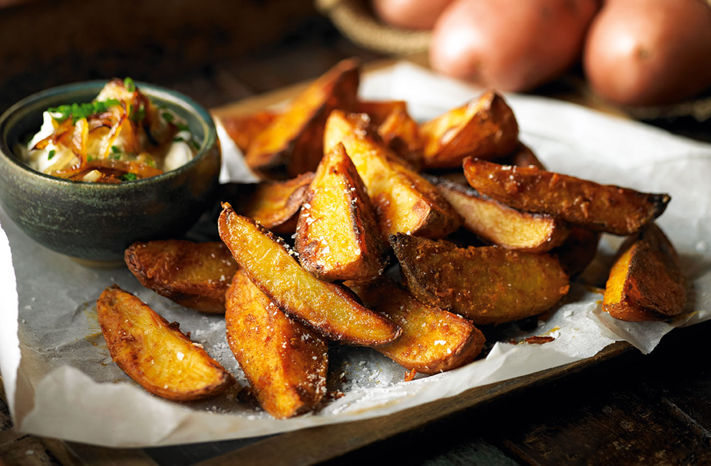 Spicy potato wedges with onion, chive and sour cream dip recipe