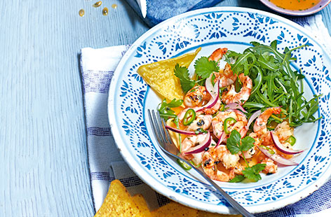Add a fresh twist to a classic prawn salad by adding tropical passion fruit and crunchy tortillas. The sweet passion fruit pulp pairs beautifully with the king prawns and peppery wild rocket. You can make this easy recipe in just 30 minutes