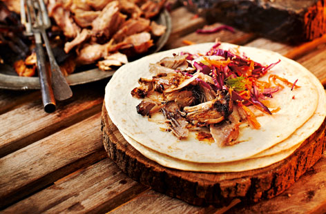 Time is the secret to this delicious pulled-pork wrap, the maple and mustard marinade gives tender and succulent meat