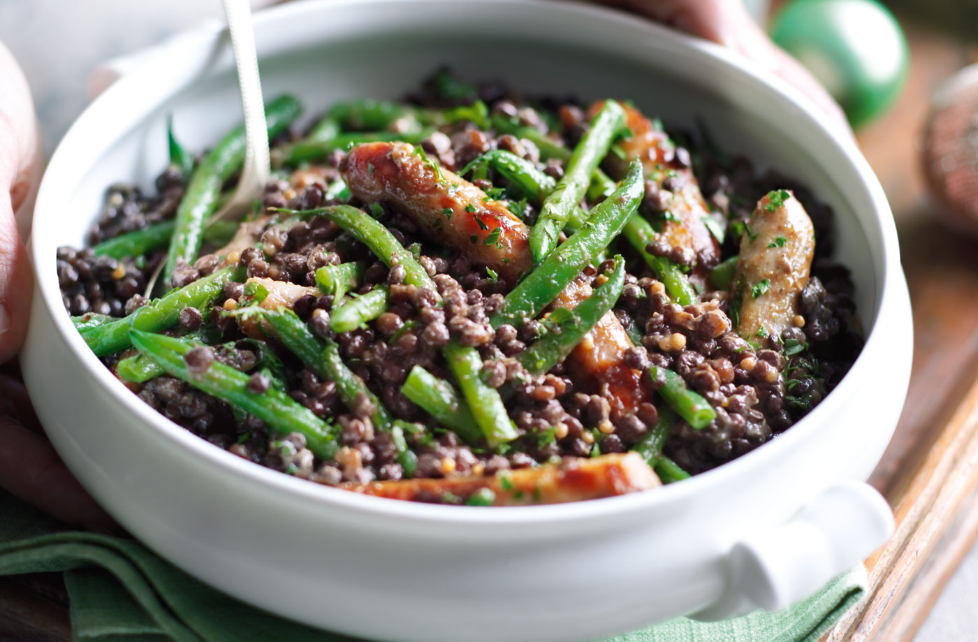 Puy lentils with chipolatas, green beans and sweet mustard dressing recipe