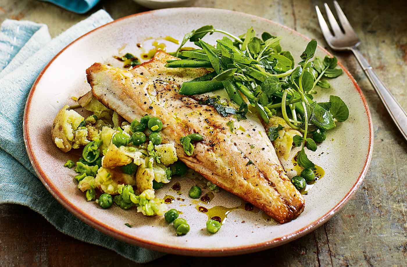 Pan-fried sea bass with pea and potato salad recipe
