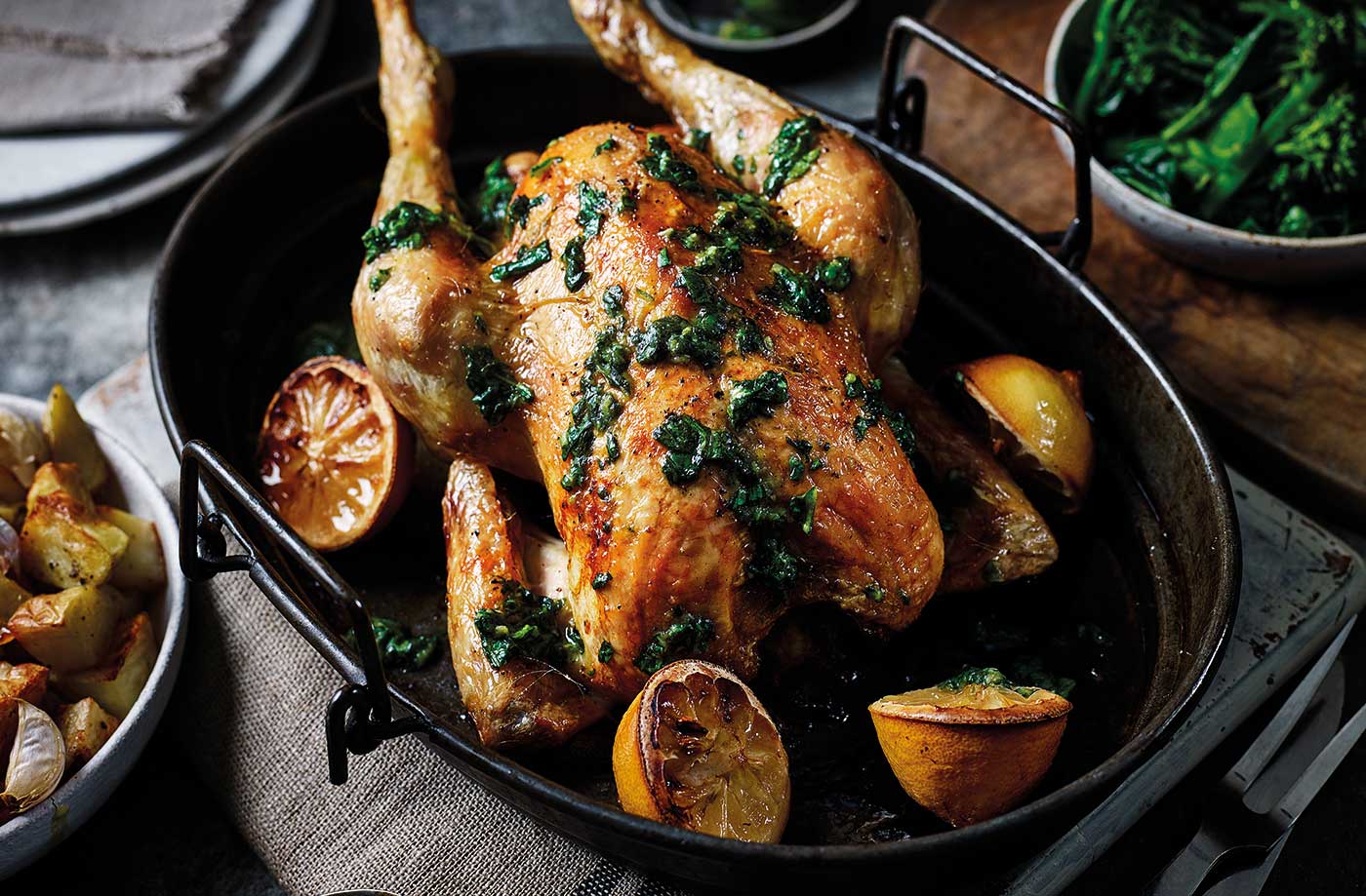 Roast chicken with basil and lemon salsa and garlic potatoes recipe