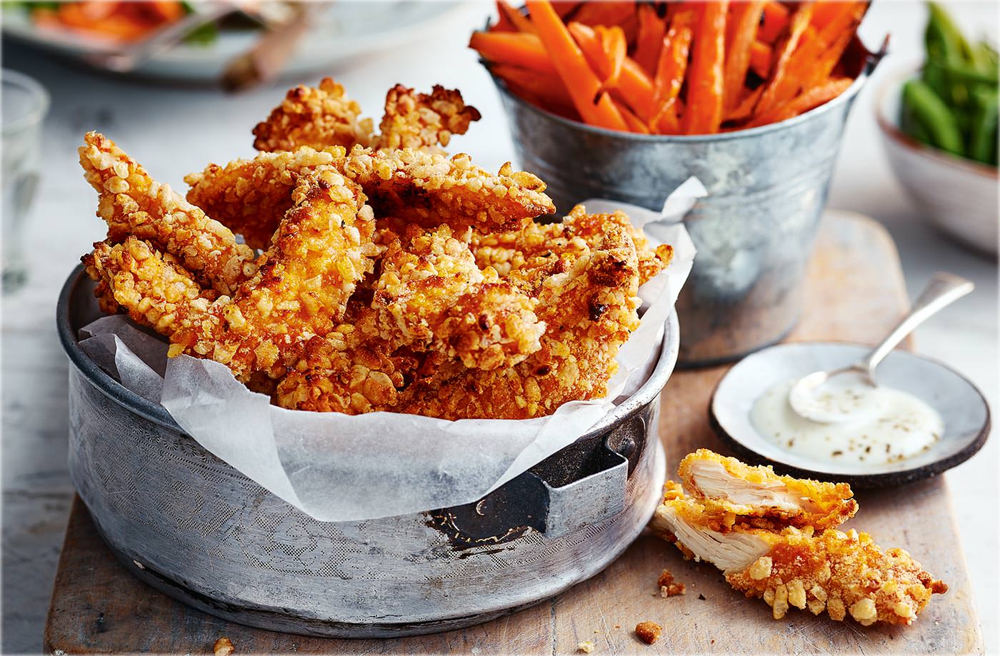 Crunchy chicken goujons with carrot 'fries' recipe