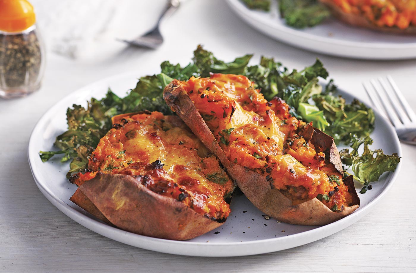 Loaded sweet potatoes with crispy kale and Cheddar recipe