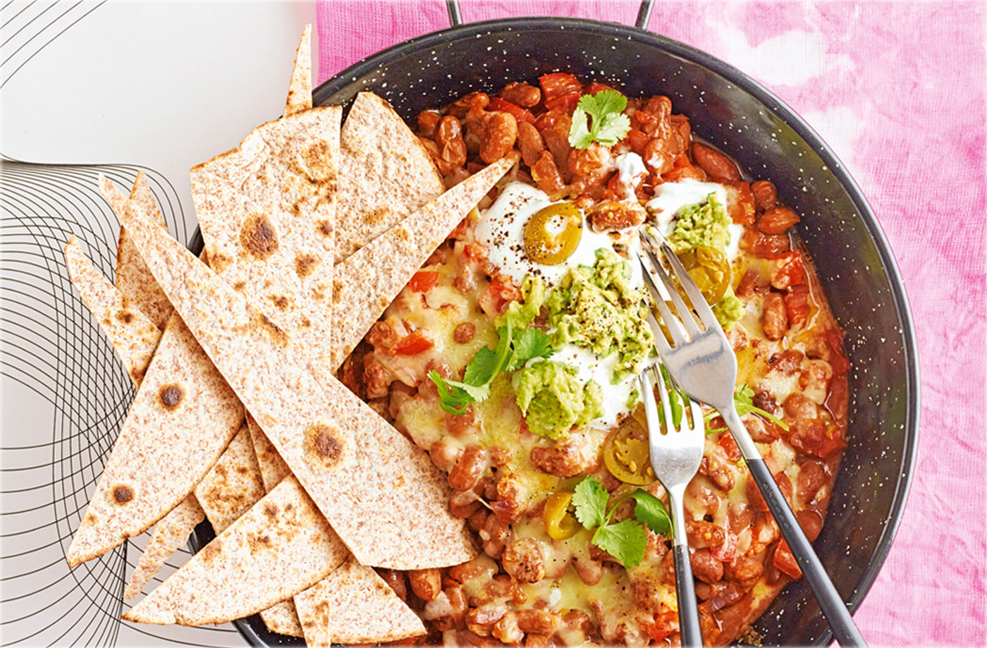 Wholemeal nachos with spicy pinto beans and guacamole recipe