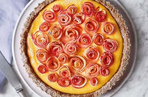 With a unique floral twist, this creamy custard tart is beautifully decorated with pretty pink apple roses and is a brilliant baking idea for Mother's Day