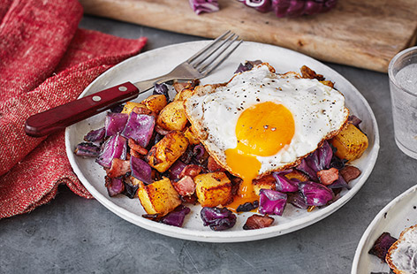 Banish the cold with an indulgent wintery brunch that's packed with vibrant seasonal cabbage, smoky bacon and roasted potatoes