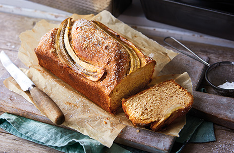 Classic banana bread has been given a vegan makeover for a teatime treat everyone can enjoy. This simple cake uses oil instead of butter and is topped with a sliced whole banana for a pretty, bakery-worthy finish.