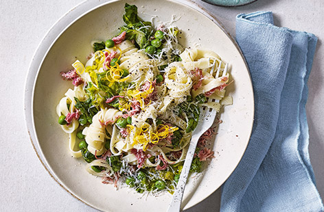 For a healthy twist on classic carbonara, try this pea and ham tagliatelle recipe. Romaine lettuce leaves are cooked with garlic and shallots until wilted, combined with ham hock, tagliatelle and peas and topped with Parmesan and zesty lemon