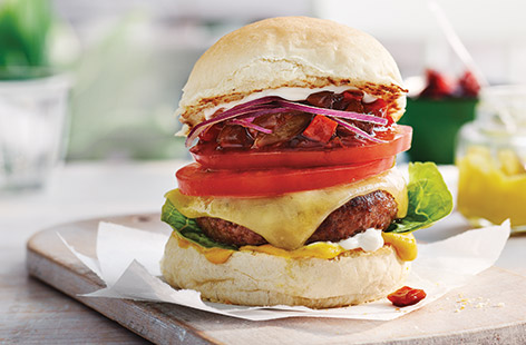 Celebrate the classic pairing of cheese and pickle with this seriously stacked burger recipe
