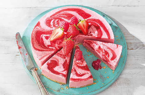 This vibrantly pink berry no-bake cheesecake makes a show-stopping summer dessert, yet is incredibly easy to make as there’s no tricky baking involved – just a little bit of stirring on the hob and blitzing in a food processor.