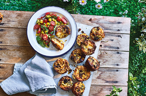These tender cornbread muffins are the perfect portable picnic snack. Melting Cheddar cheese, sweet sundried tomatoes and spicy jalapeños pack these buttery muffins with flavour for a delicious (and veggie) lunchtime alternative to standard sandwiches.