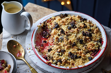 Put leftover Christmas pudding to good use with this comforting festive crumble. Filled with apples, pears and juicy blackberries, Christmas pudding is stirred through the crumble topping for an extra fruity 