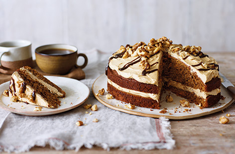 This ultimate coffee and walnut cake is a must for coffee lovers, with a bitter-sweet combination of walnut-studded sponge, fluffy buttercream and indulgent drizzle of coffee caramel. 