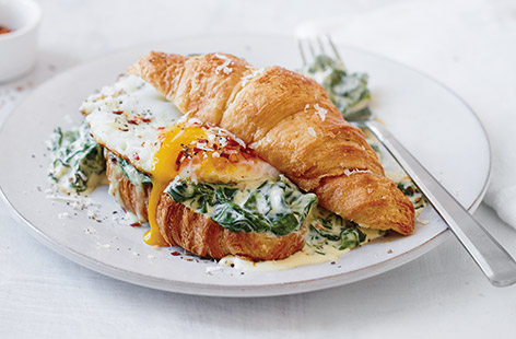 Upgrade your brunch game this weekend with the ultimate savoury croissant, oozing with creamy spinach and a golden runny egg.