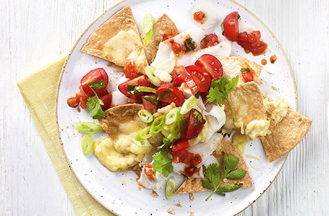 Kids will love this colourful nachos recipe, with flaky white fish, tangy salsa and oozy cheese