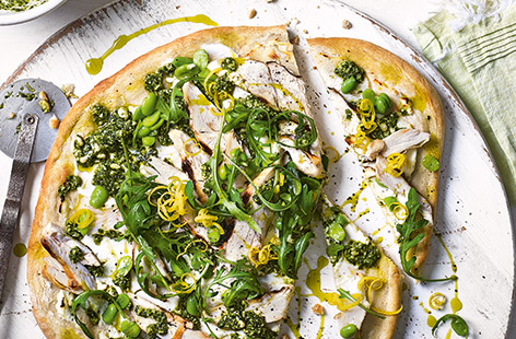 Find your new favourite pizza topping with this summery twist on an Italian favourite. This easy pizza recipe use speedy pizza base mixes for a handy shortcut – topped with creamy ricotta, lemon chicken, broad beans and plenty of rocket.