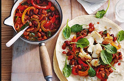 These loaded fish burritos are made using fish fingers to save time and keep costs down
