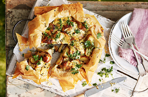 This free-form tart makes an impressive vegetarian main or picnic dish. Creamy goat’s cheese and herby buttered potatoes fill a crispy filo pastry case for a healthy bake that still feels indulgent.