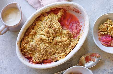 You can’t go wrong with an old-fashioned rhubarb crumble recipe. This timeless, easy-to-make pud is a great way to make the most of pretty, pink rhubarb, with the tangy fruit balanced by the sweet, buttery crumble topping. Serve warm with custard, cream or ice cream for an indulgent, comforting dessert.