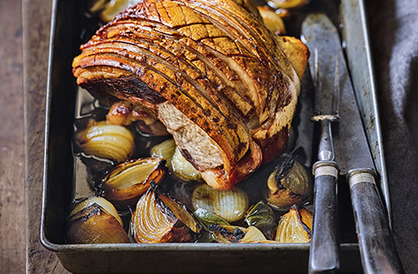 Keep it simple at your next Sunday lunch with this classic roast pork recipe. For the perfect crackling, prepare the pork 2 hrs ahead of cooking and season with garlic and sage