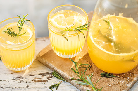 This herbal twist on a homemade lemonade is a sophisticated soft drink to serve all summer.  Fragrant rosemary combines with fresh oranges and lemons for a super refreshing non-alcoholic spritz. 