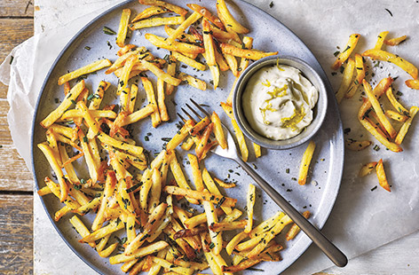Take oven chips to the next level – bake until crisp and golden, toss with rosemary and sea salt and serve with a quick lemon and garlic mayo for dunking
